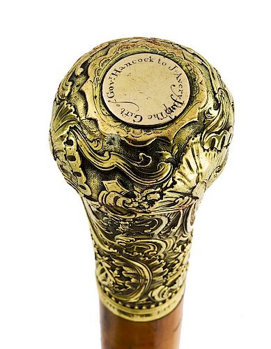 THE GOLD-MOUNTED, PRESENTATION WALKING STICK OF JOHN HANCOCK, C. 1755 44 ¼ in L overall, with a gold, embossed knob or head 3 1/8/AuctionDaily