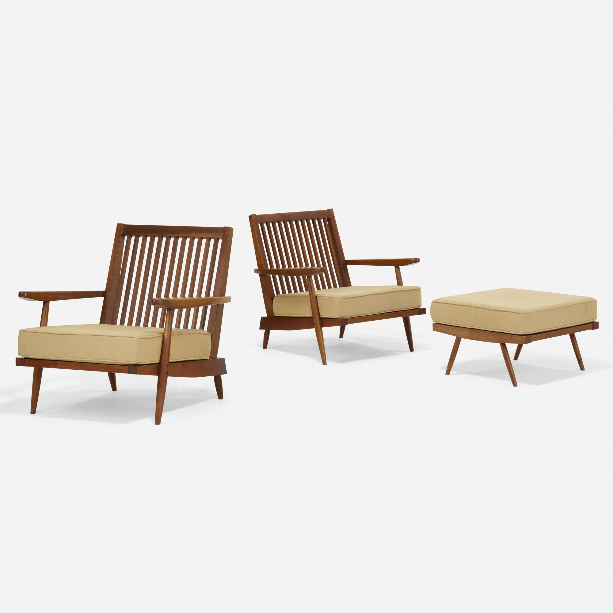 George Nakashima Cushion armchairs, pair and ottoman/auctiondaily