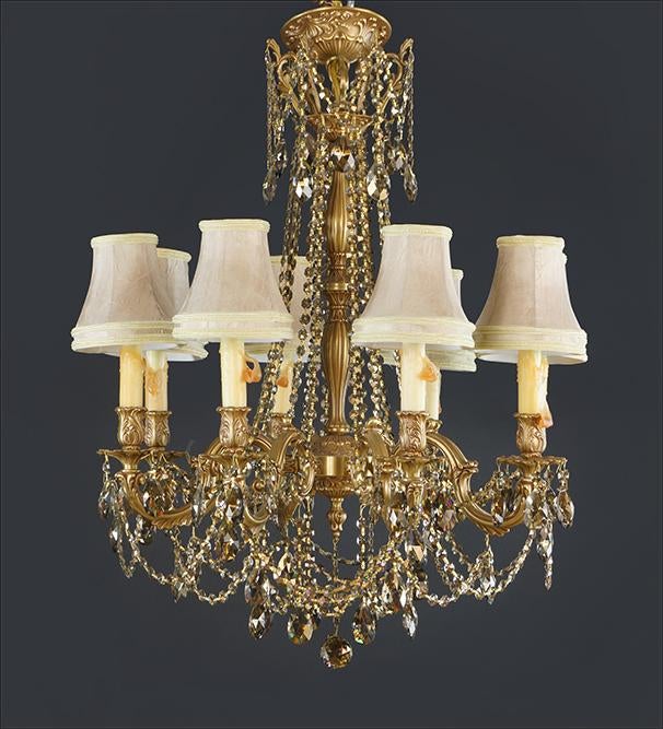 A Schonbek Brass and Crystal 8-Light Chandelier/Auctiondaily