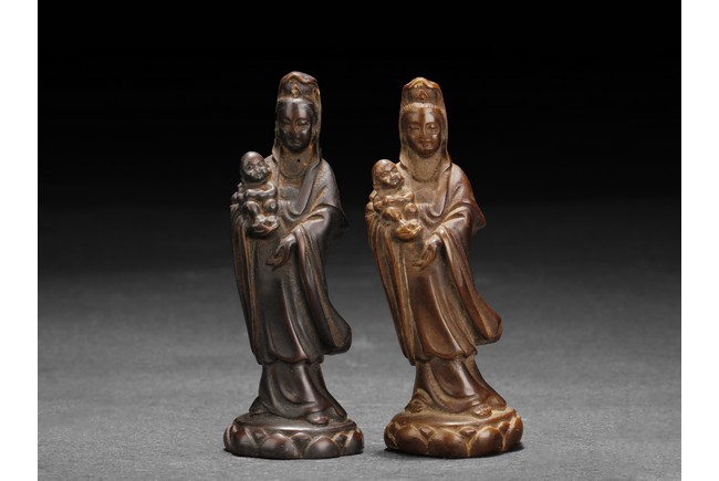 TWO CARVED GUANYIN FIGURES