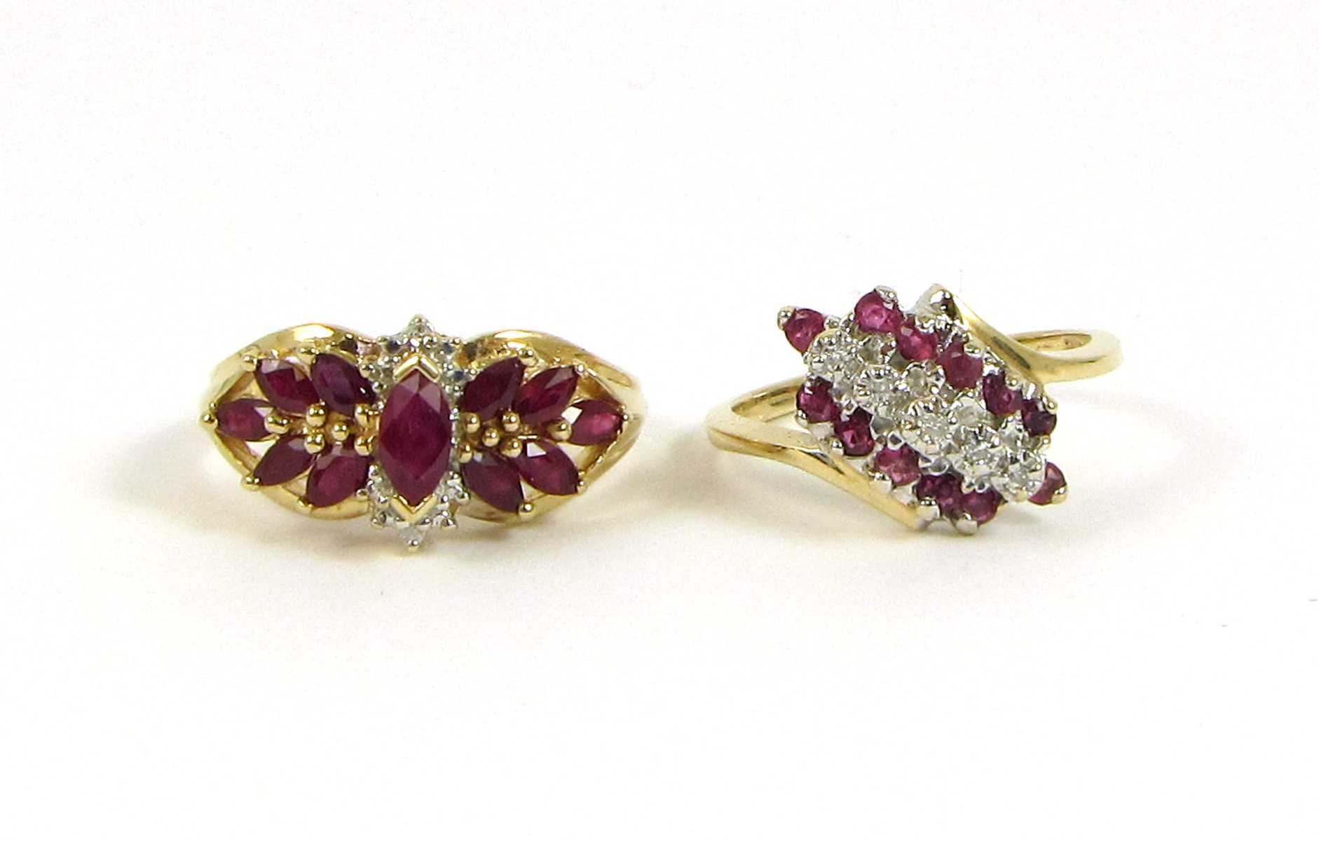 TWO RUBY, DIAMOND AND YELLOW GOLD RINGS