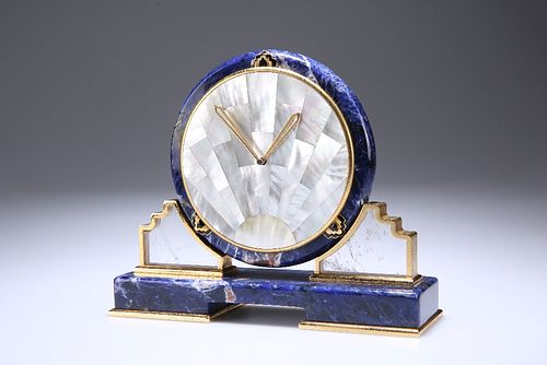 A CARTIER LAPIS LAZULI AND MOTHER-OF-PEARL SUNBURST DESK CLOCK