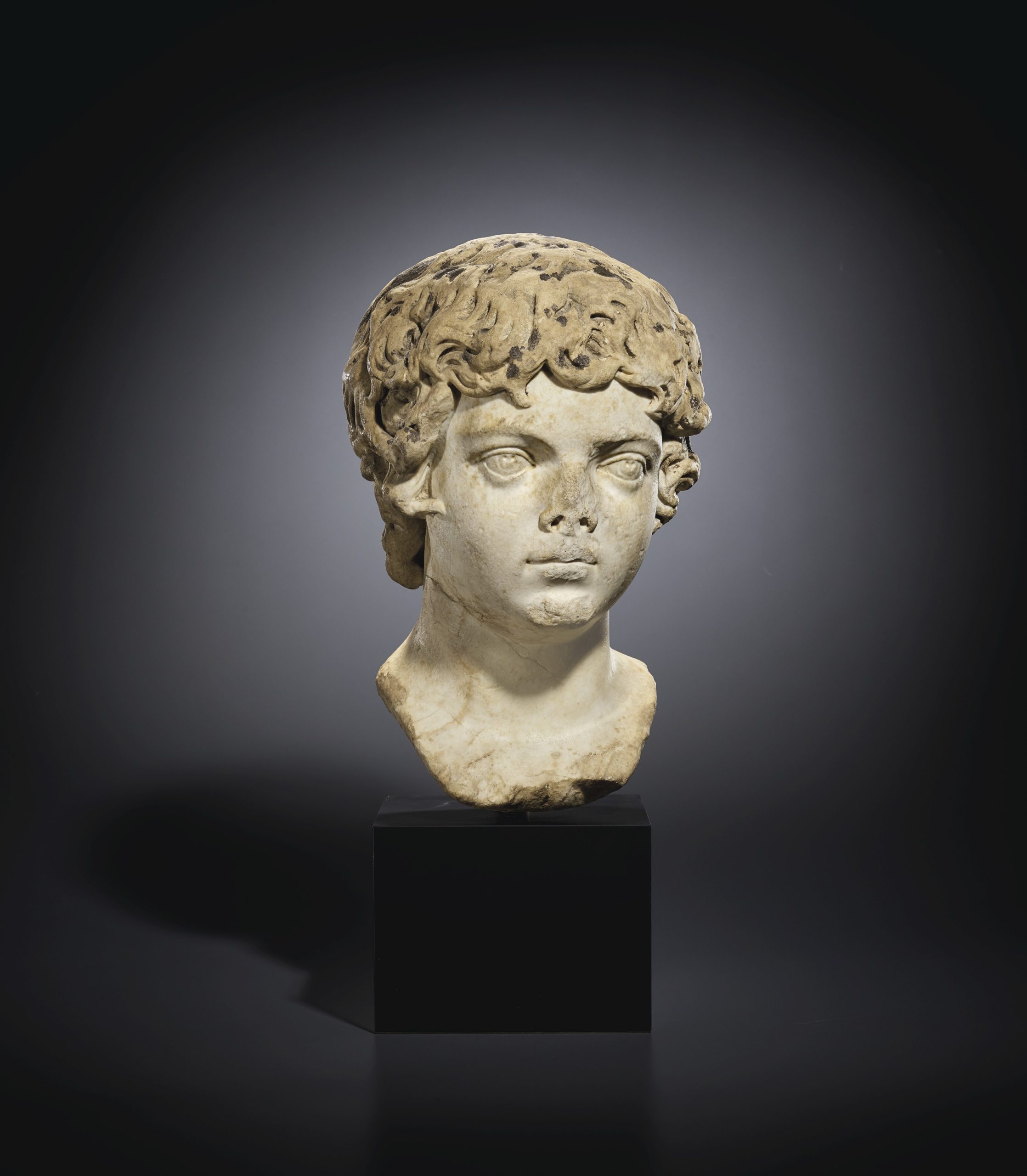 A ROMAN MARBLE PORTRAIT BUST OF THE YOUNG CARACALLA