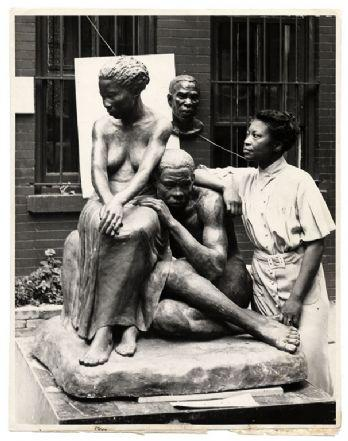 Augusta Savage with her sculpture titled Realization in 1938. Image from the Archives of American Art, Smithsonian Institution.