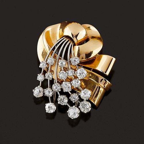 A 18K two-color gold and diamond brooch