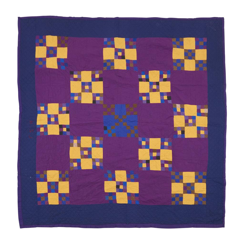 Amish Nine Patch variation patterned quilt