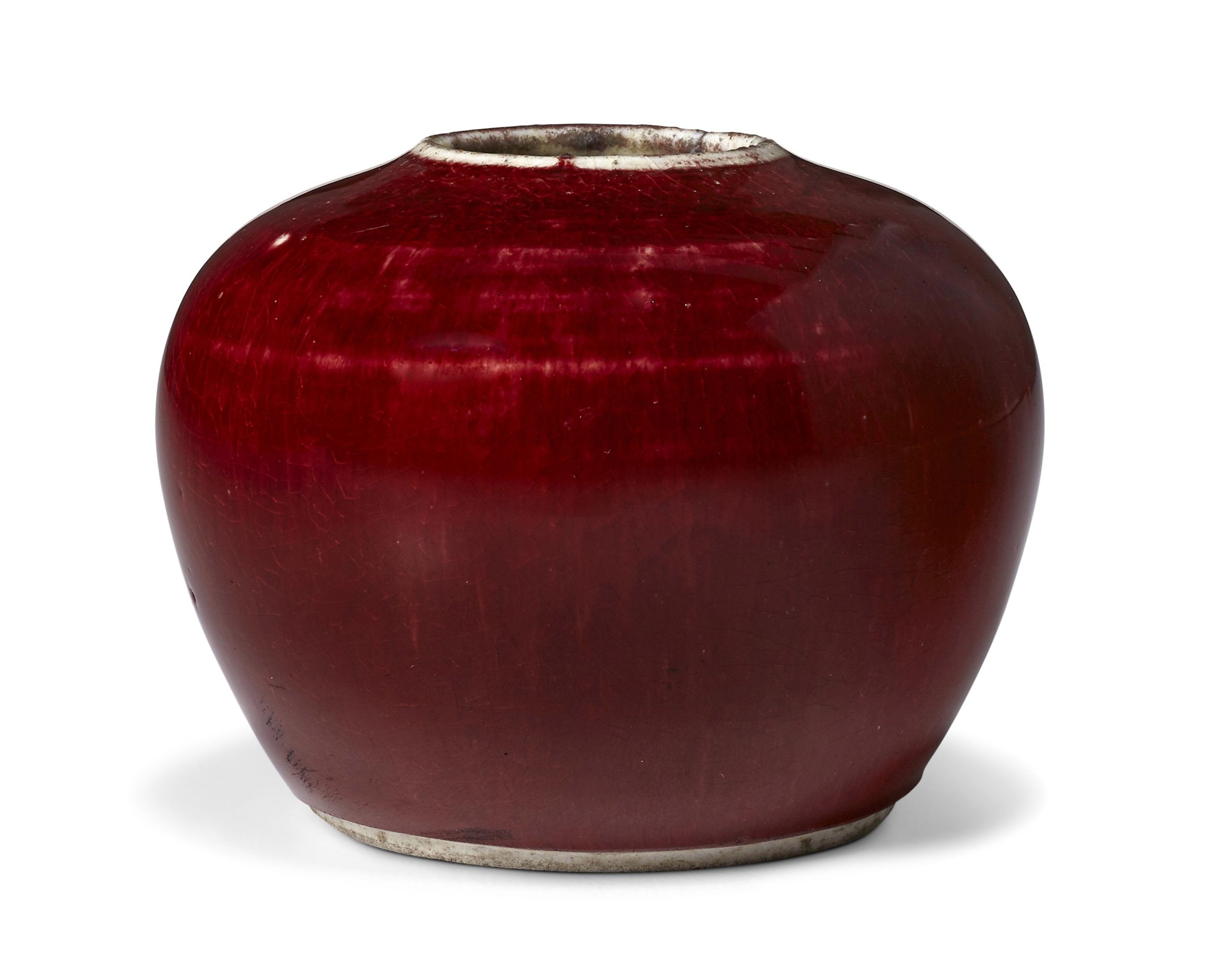 A SMALL COPPER-RED-GLAZED GLOBULAR WATER POT