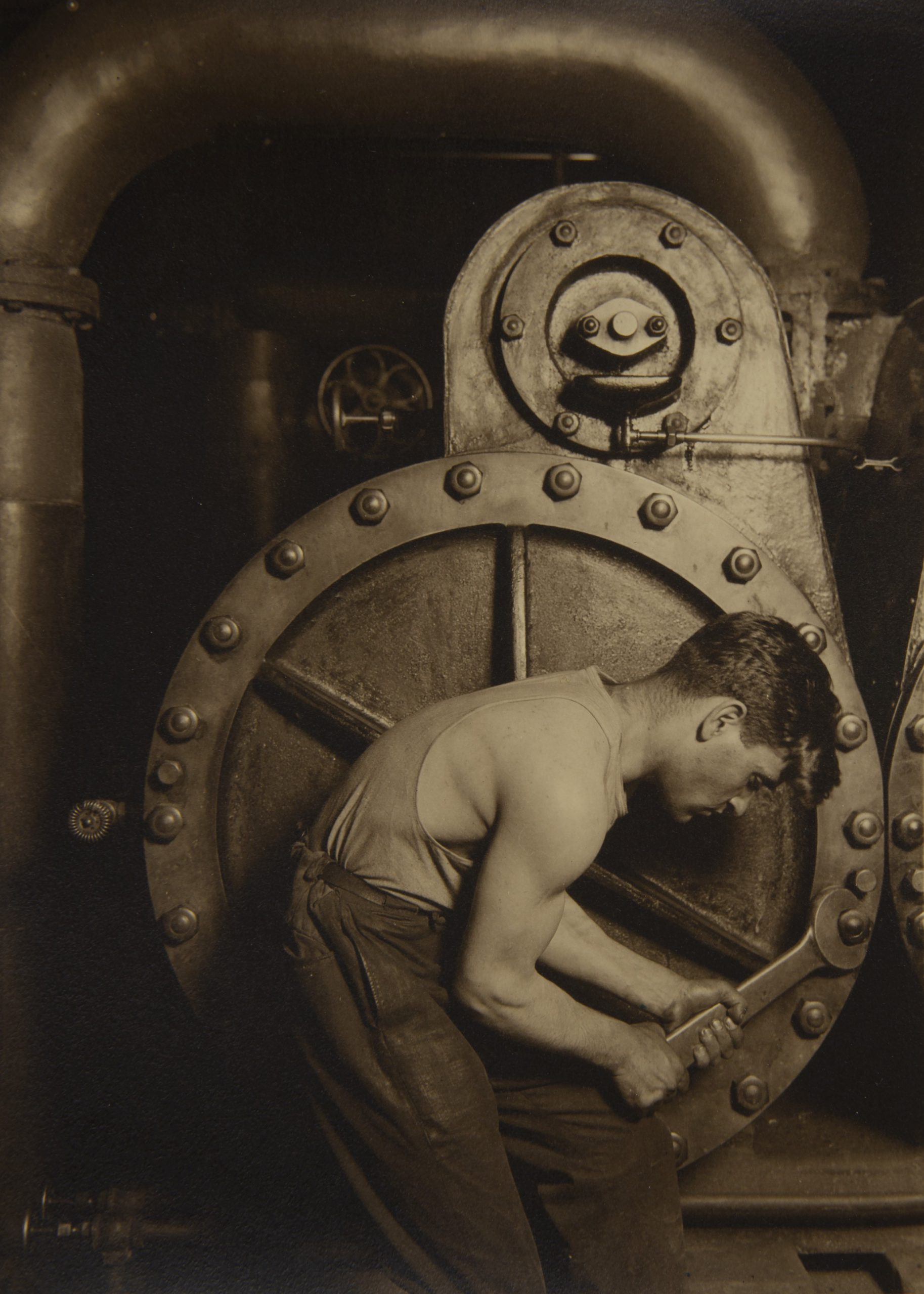 Lewis Wickes Hine (1874–1940) Mechanic and Steam Pump, 1921