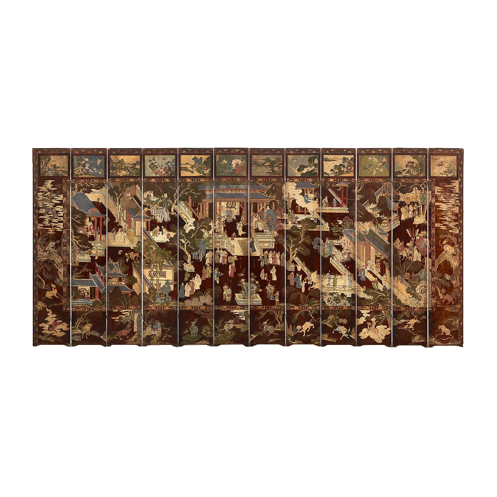 A Chinese carved twelve-panel "Coromandel" folding screen 17th/18th Century