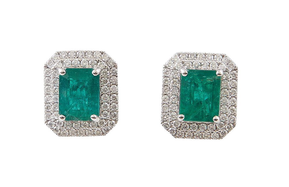 Pair of Platinum Earrings, with a central 1.98 ct. emerald atop a double concentric graduated border of round diamonds, with a screw post, total emerald