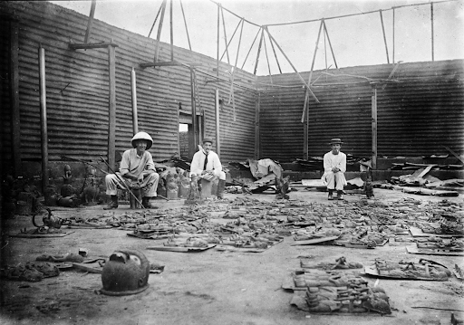 Inside the Oba of Benin’s palace in 1897 after the British raid. Image via Creative Commons/ Reginald Kerrgranville.