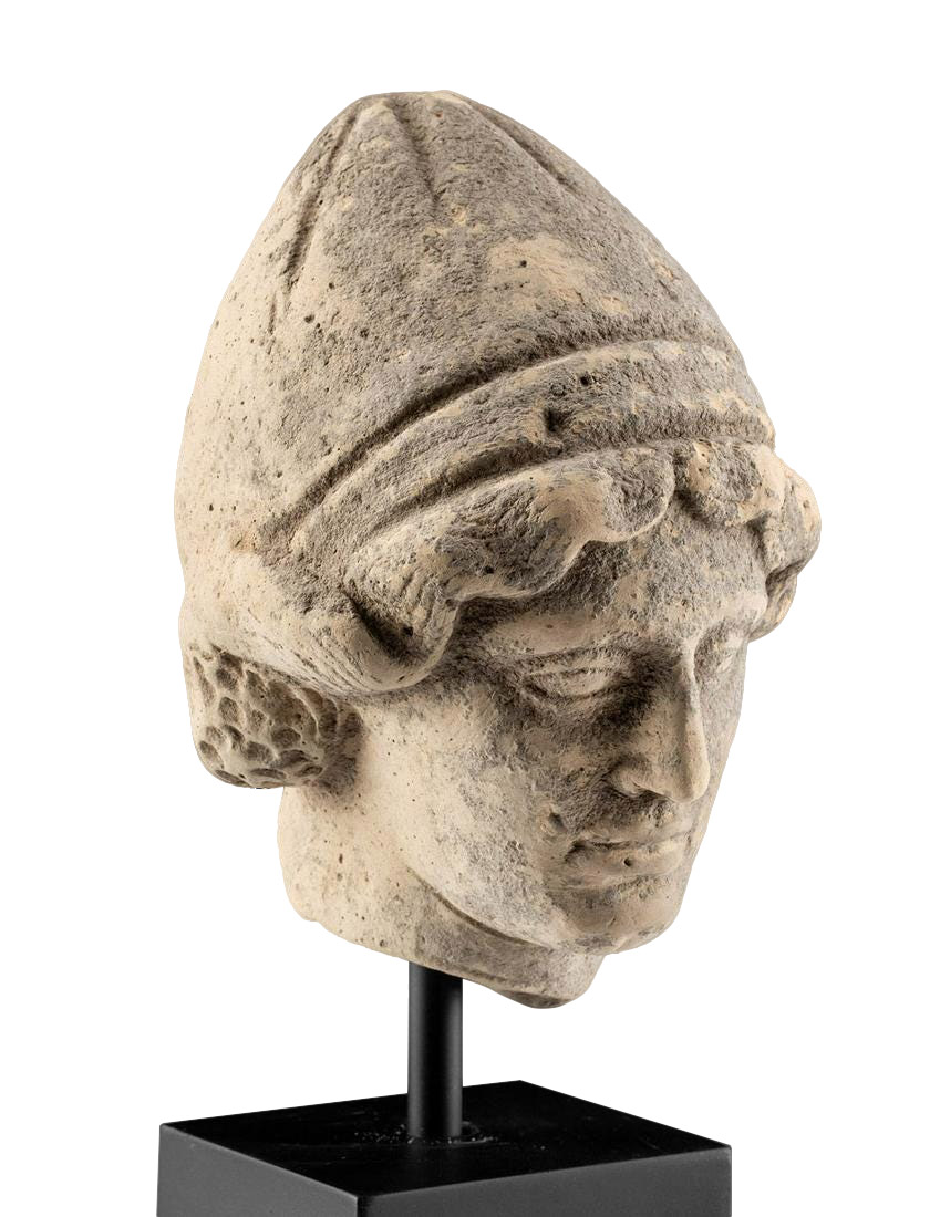 Greek Terracotta Head of a Youth Wearing Pilos Helmet