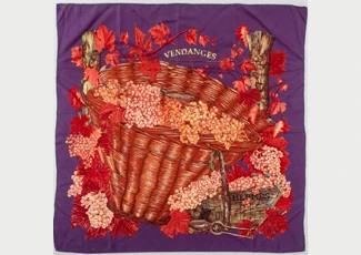 Hermes silk twill scarf in the Vendanges pattern in red on a purple ground, marked HERMES lower right, MADE IN FRANCE - SOIE 100% SILK to revers