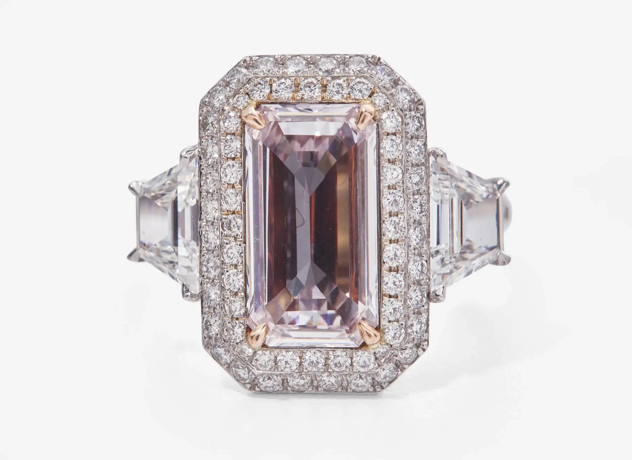 A Platinum, Rose Gold, Pink Diamond, and Diamond Ring